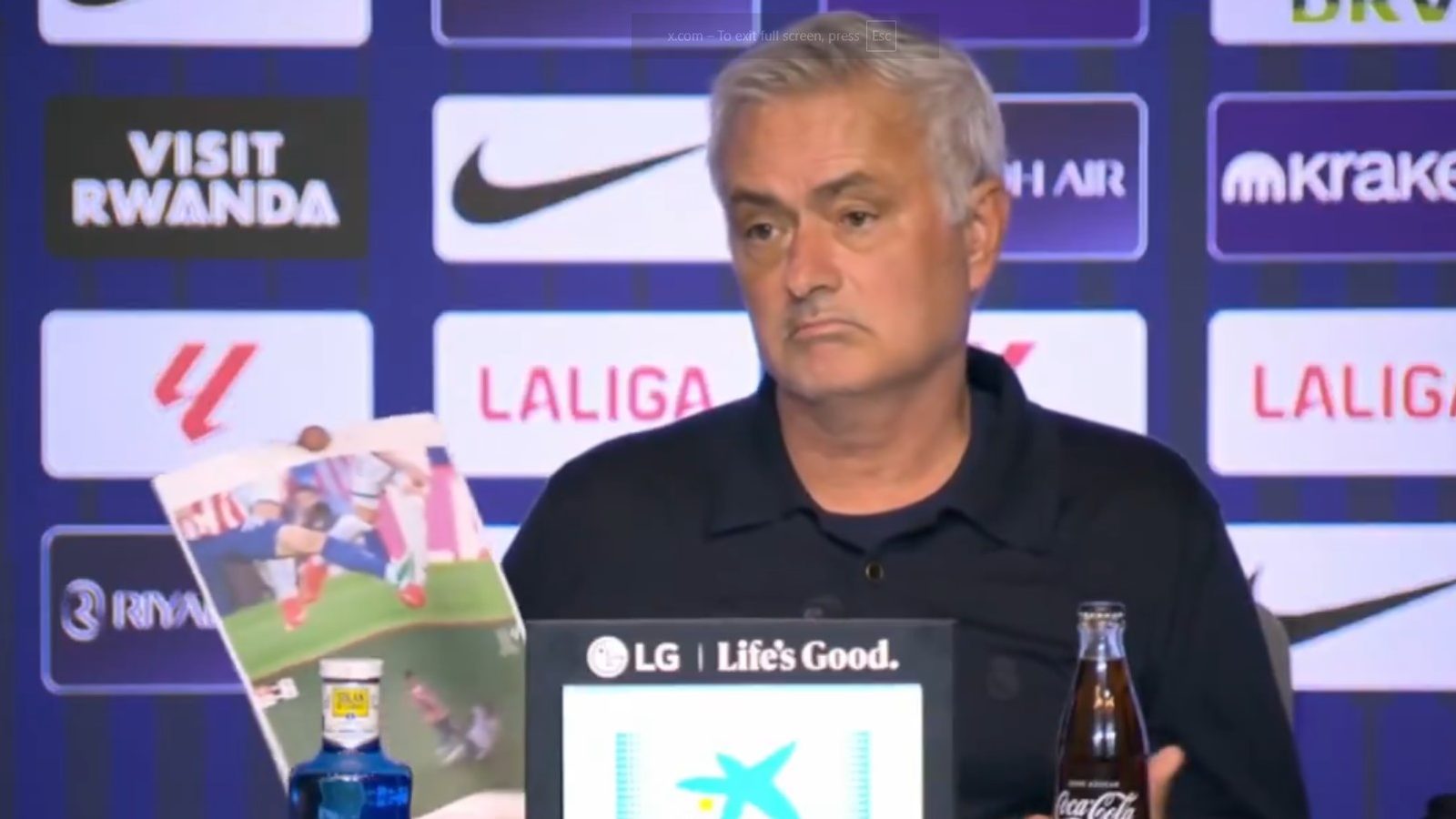 Mourinho shows photos at press conference and says Atletico deserved two red cards